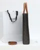 CELINE Vertical Cabas bag in calfskin with logo print and Celine print