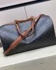 CELINE Medium duffle bag in logo-print calfskin