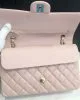 Chanel Medium Classic Double Flap Light Pink Caviar Light Gold Hardware