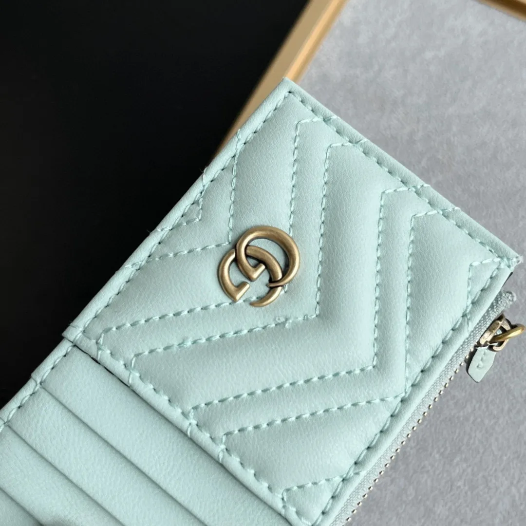 Gucci GG Marmont matelassé leather super mini bag