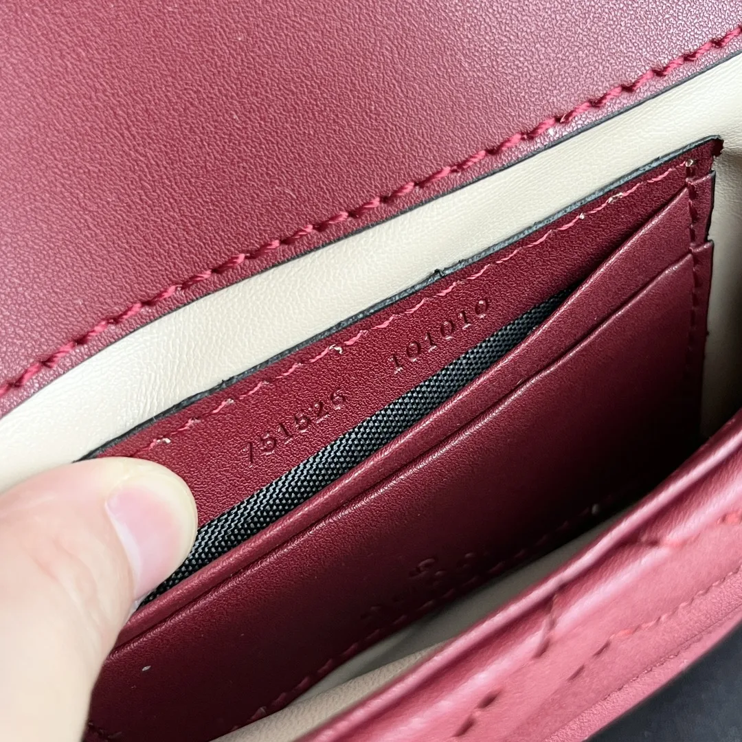 Gucci GG Marmont matelassé leather super mini bag