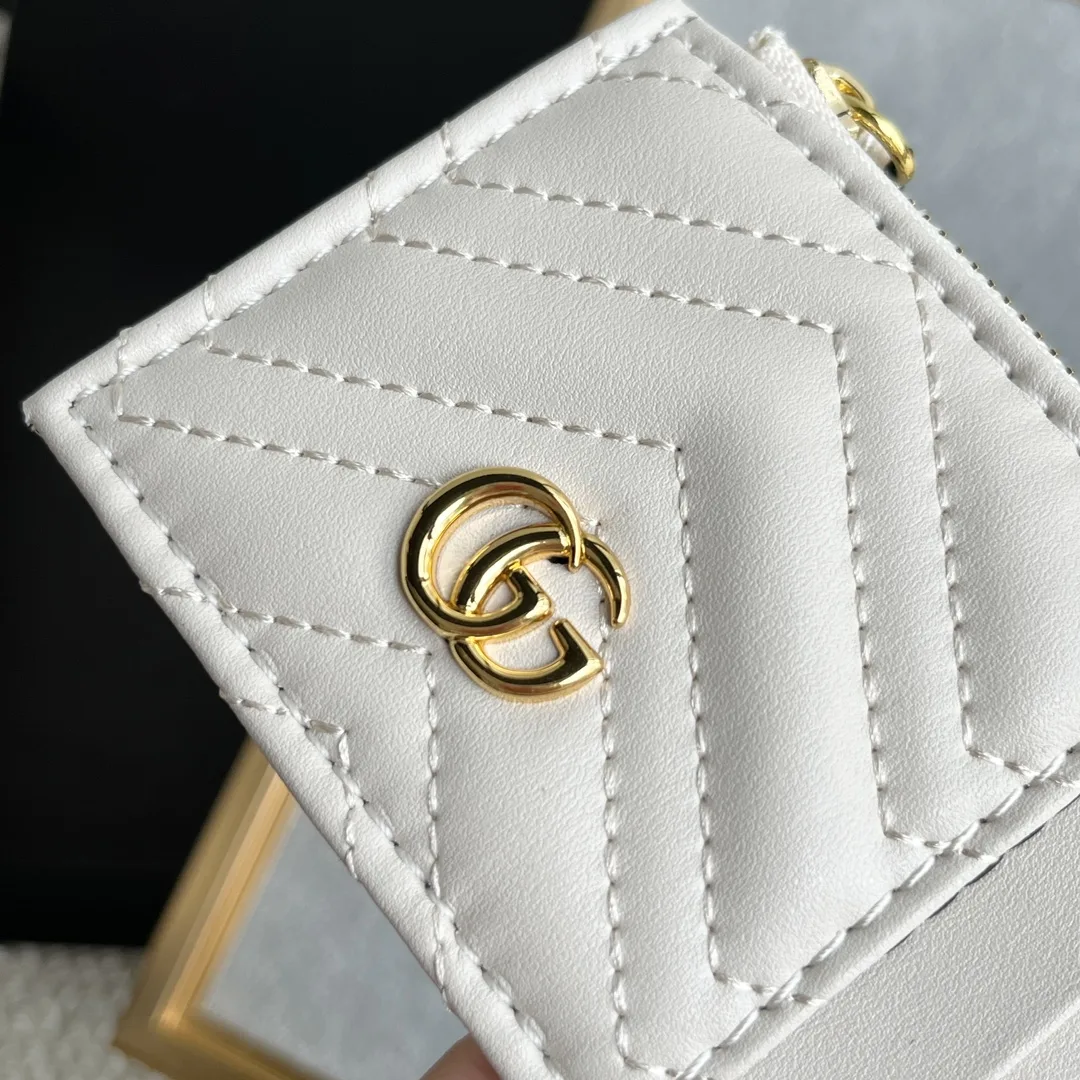 Gucci GG Marmont matelassé leather super mini bag
