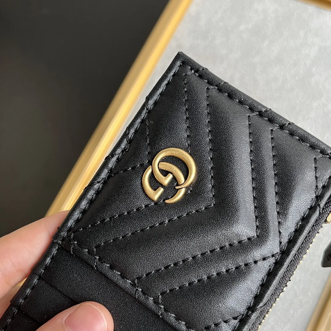 Gucci GG Marmont matelassé leather super mini bag