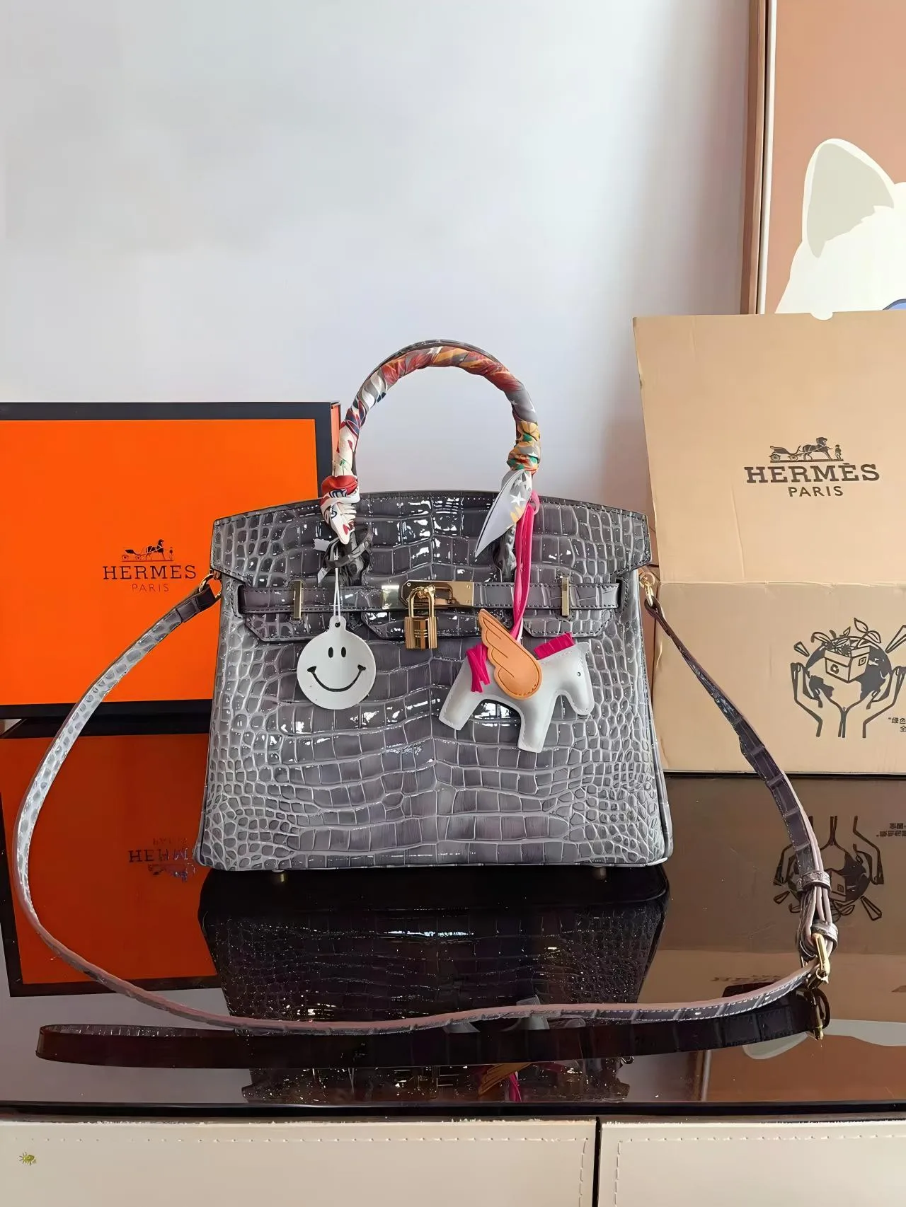 Hermès Birkin 25 / 30 Gris Crocodile Embossed Leather Handbag with Pegasus Charm & Smiley Tag (Gold Hardware)